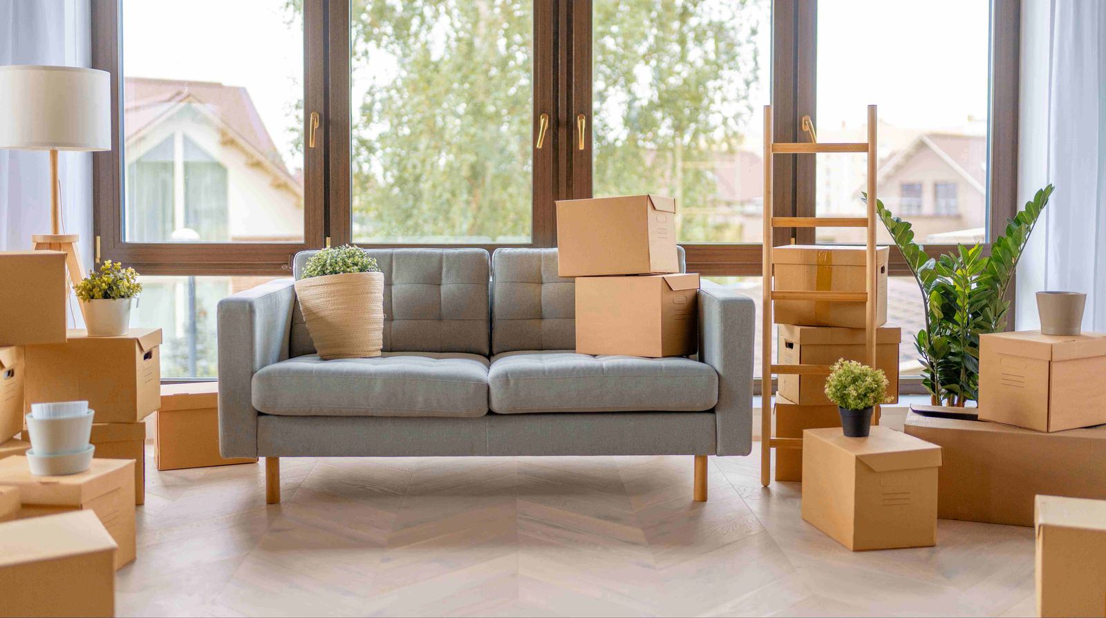 Sofa and boxes staged near a front door in an Atlanta home